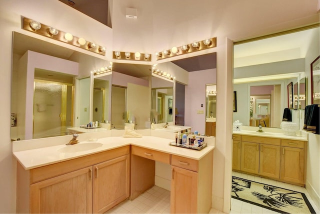 bathroom with vanity and walk in shower