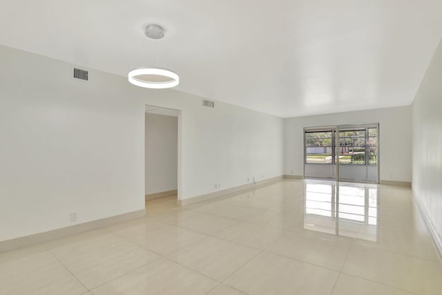 view of tiled spare room