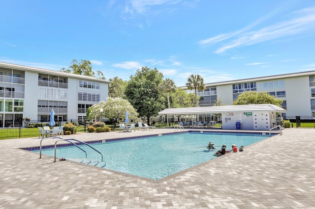 view of pool featuring a patio area