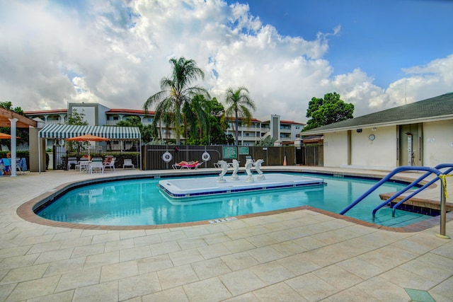 view of pool with a patio