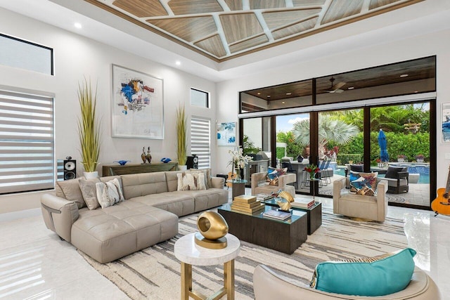 living room featuring french doors, wooden ceiling, and a high ceiling