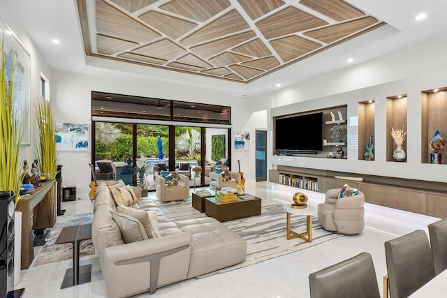 living room featuring french doors, coffered ceiling, and wood ceiling