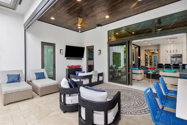 view of patio / terrace featuring ceiling fan