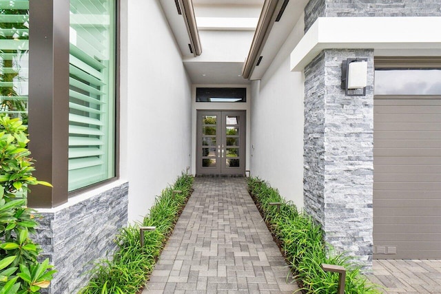 entrance to property featuring french doors