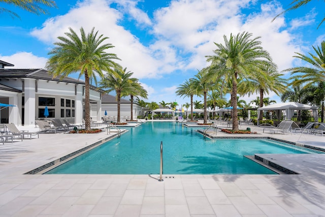 view of swimming pool with a patio area