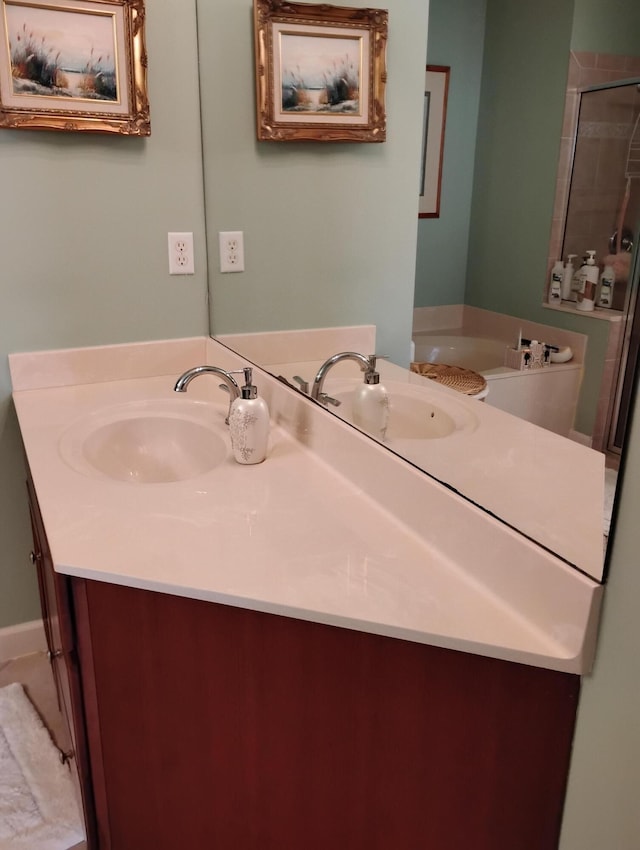 bathroom with vanity and walk in shower