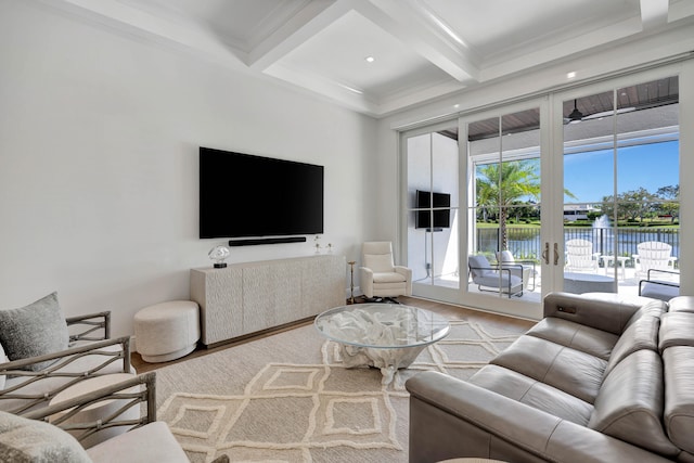 living room with coffered ceiling, hardwood / wood-style flooring, crown molding, and beam ceiling