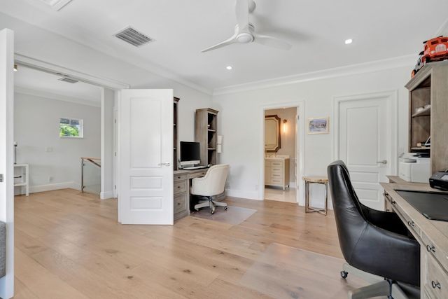 office featuring light wood-type flooring, ceiling fan, and crown molding