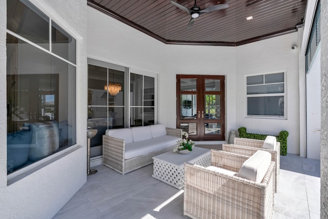 view of patio / terrace featuring french doors, outdoor lounge area, and ceiling fan