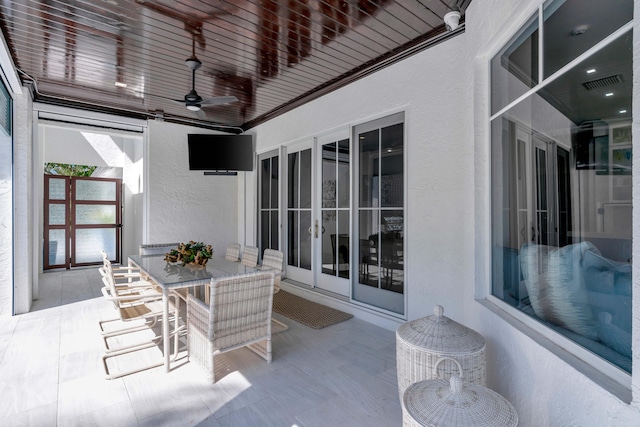 view of patio / terrace featuring ceiling fan