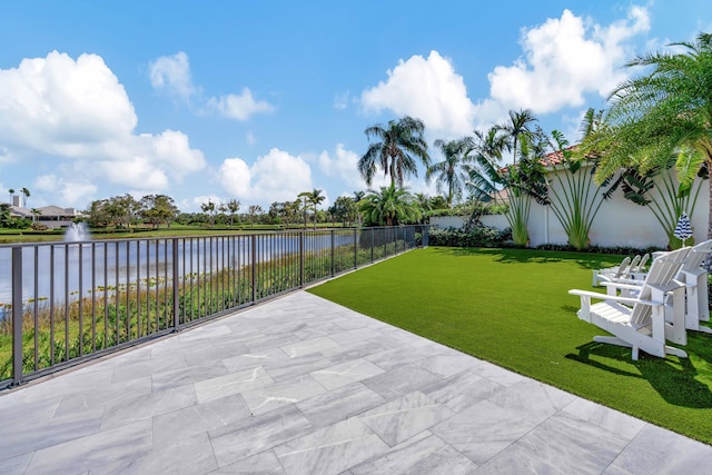 view of patio / terrace with a water view