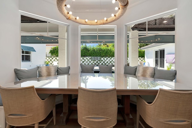 dining room featuring crown molding