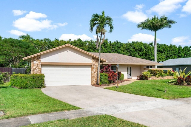 ranch-style home with a garage and a front yard