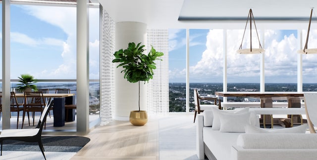 bedroom with wood-type flooring and floor to ceiling windows