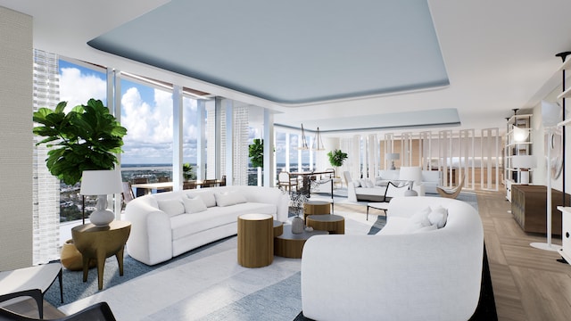 living room featuring plenty of natural light and light parquet floors