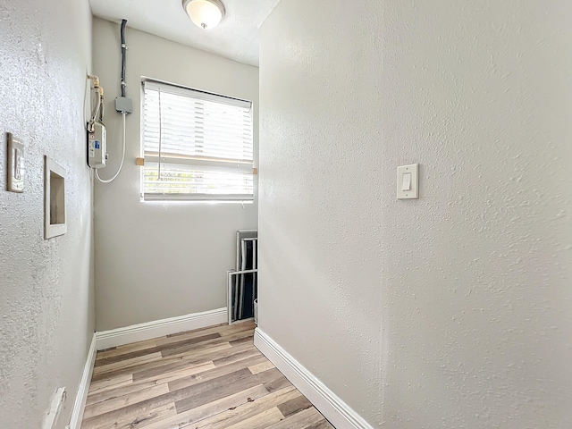 hall featuring light hardwood / wood-style floors