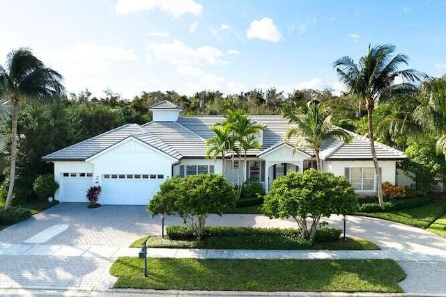 ranch-style home with a garage