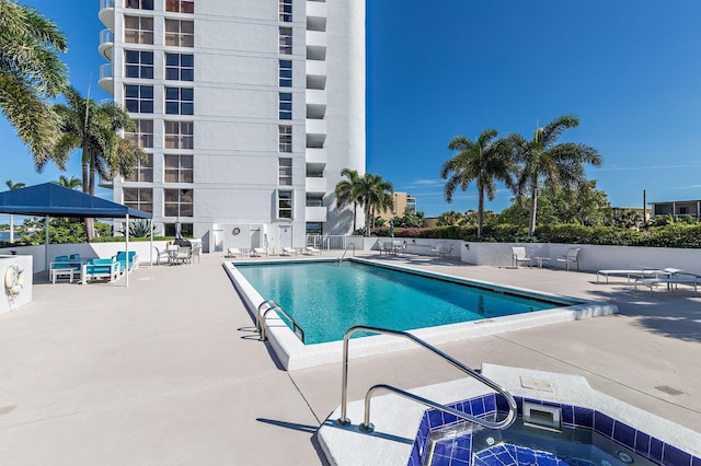 view of pool featuring a patio