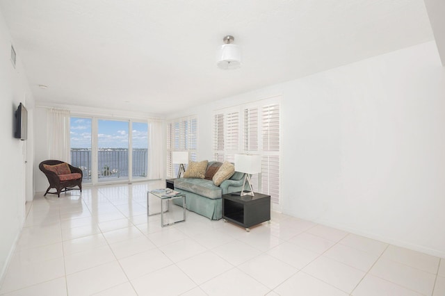 tiled living room with expansive windows