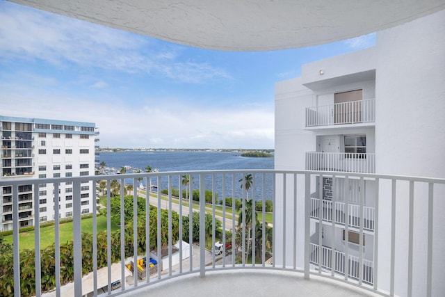 balcony featuring a water view