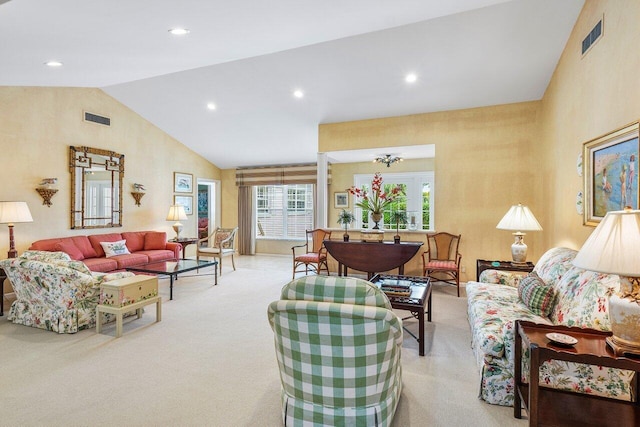 living room featuring light colored carpet and lofted ceiling