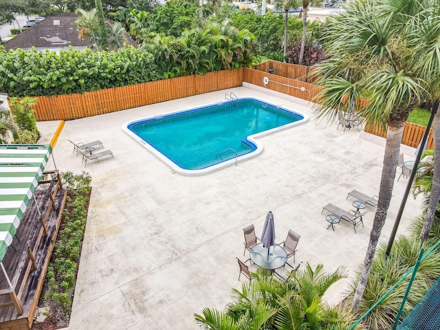 view of swimming pool featuring a patio