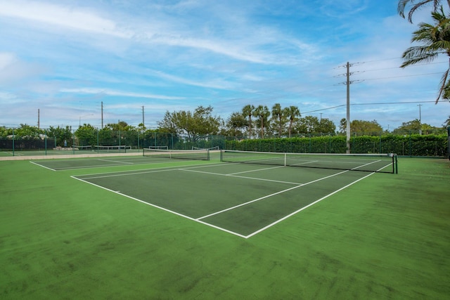 view of sport court featuring basketball hoop