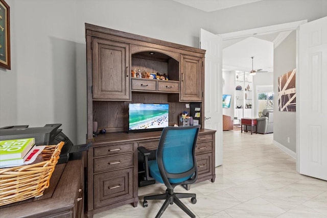 home office featuring ornamental molding and ceiling fan