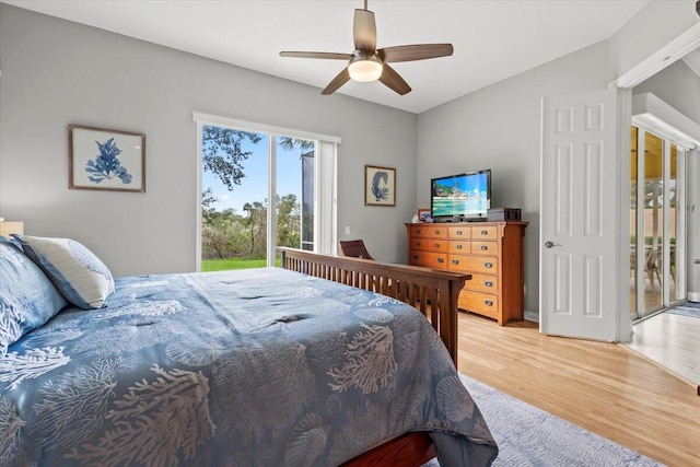 bedroom with access to outside, ceiling fan, and light hardwood / wood-style flooring