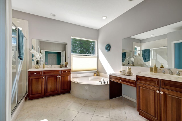 bathroom featuring tile patterned flooring, vanity, and independent shower and bath