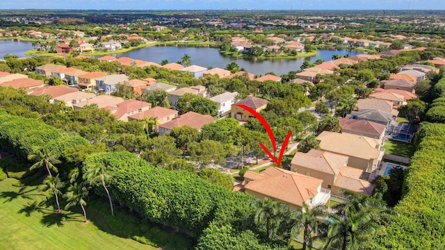 birds eye view of property featuring a water view