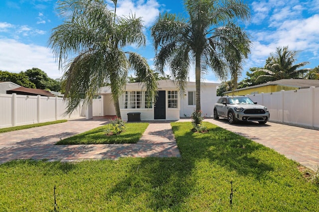 view of front of house with a front yard