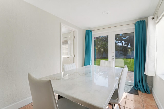 view of tiled dining space