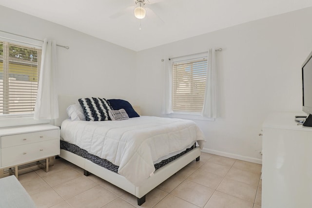 bedroom featuring ceiling fan and light tile patterned floors