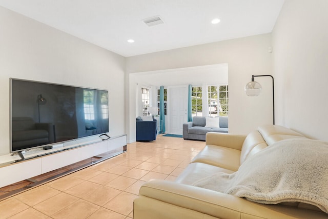 living room with light tile patterned floors