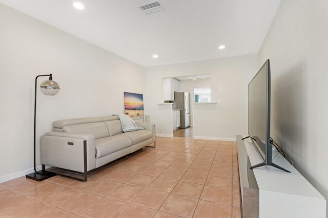 living room featuring light tile patterned floors