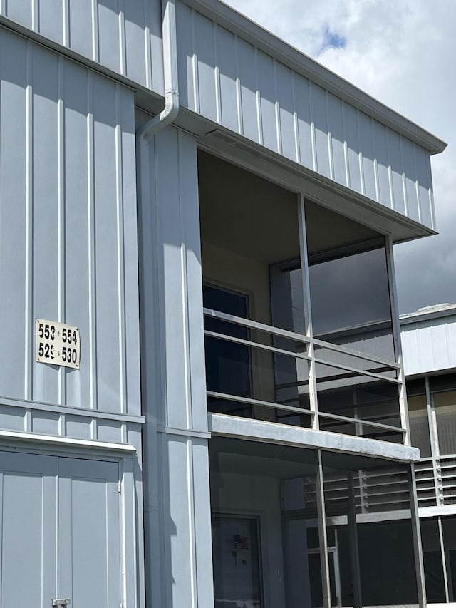 view of home's exterior with board and batten siding