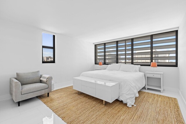 bedroom with tile patterned floors