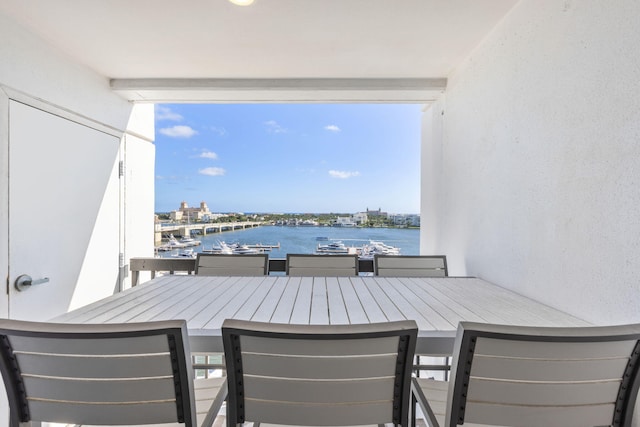 view of patio / terrace with a water view