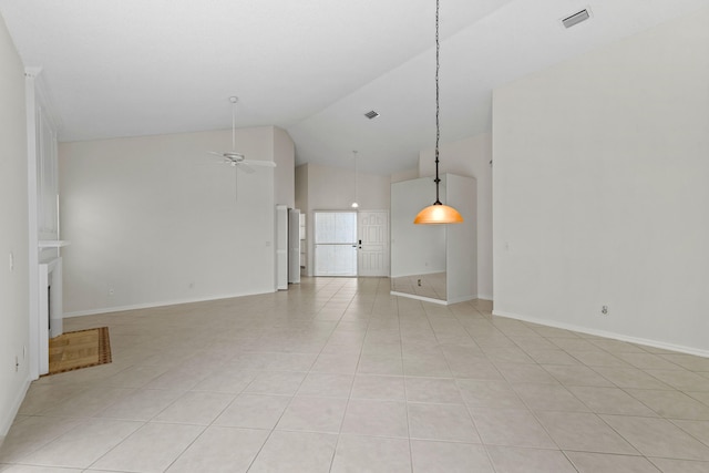 unfurnished living room featuring light tile patterned flooring, ceiling fan, and vaulted ceiling