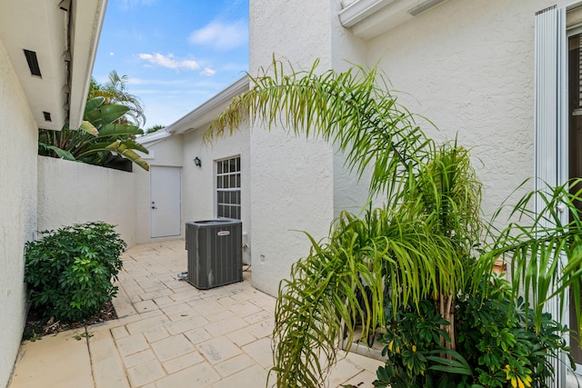 view of patio featuring cooling unit