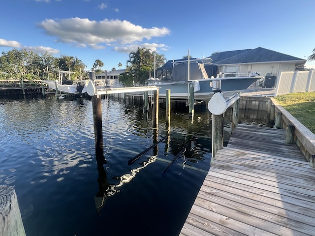 dock area featuring a water view