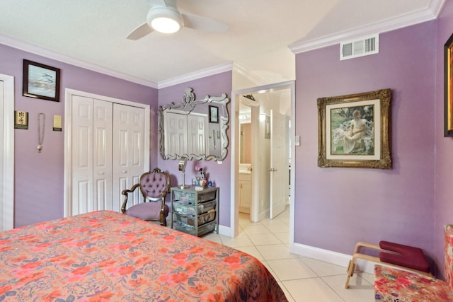 bedroom with ceiling fan, light tile patterned floors, crown molding, and a closet