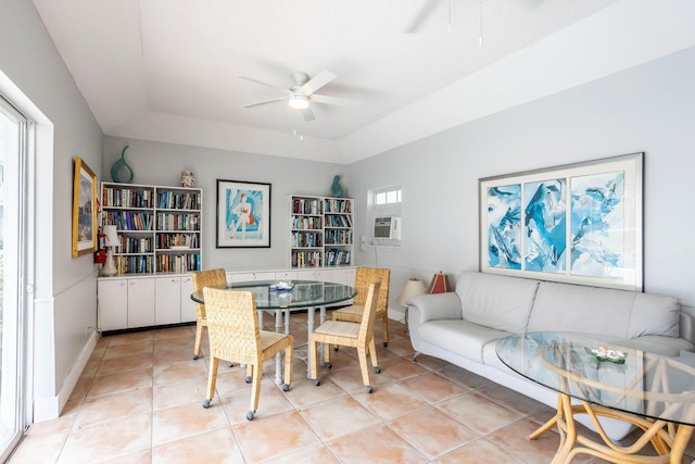 tiled dining area with cooling unit, a wealth of natural light, and ceiling fan