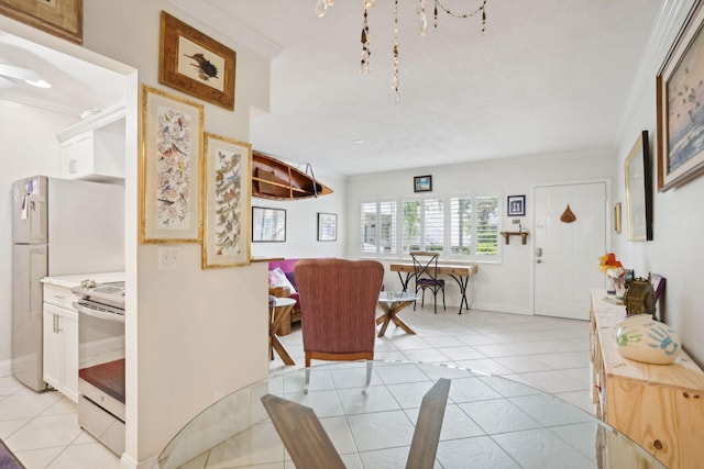 interior space featuring light tile patterned floors and crown molding