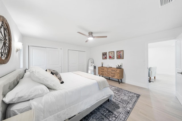 bedroom featuring ceiling fan and light hardwood / wood-style floors