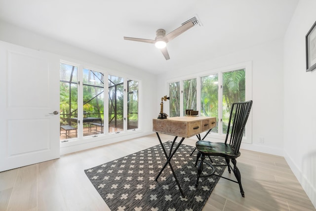 office area featuring ceiling fan and light wood-type flooring