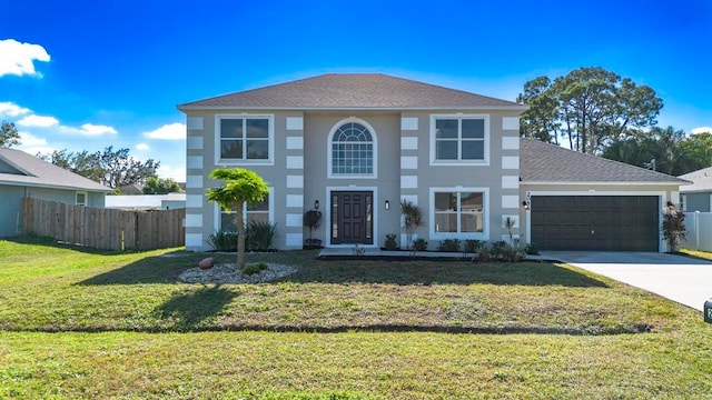 view of front facade featuring a garage and a front yard