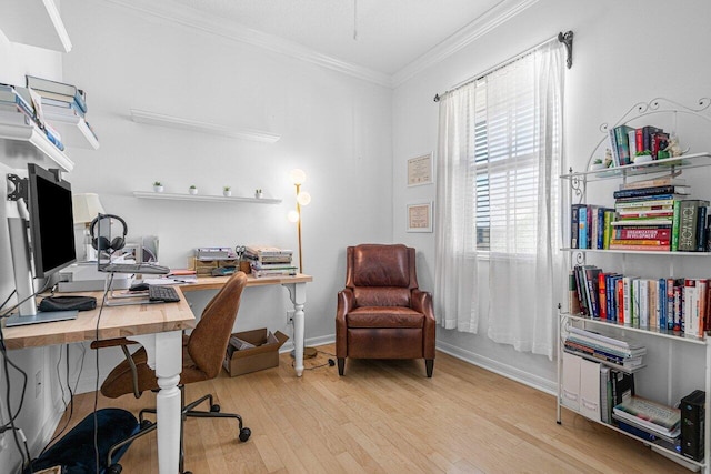 office space featuring light hardwood / wood-style flooring and crown molding