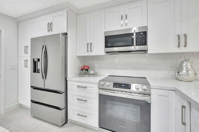 kitchen featuring white cabinets and stainless steel appliances